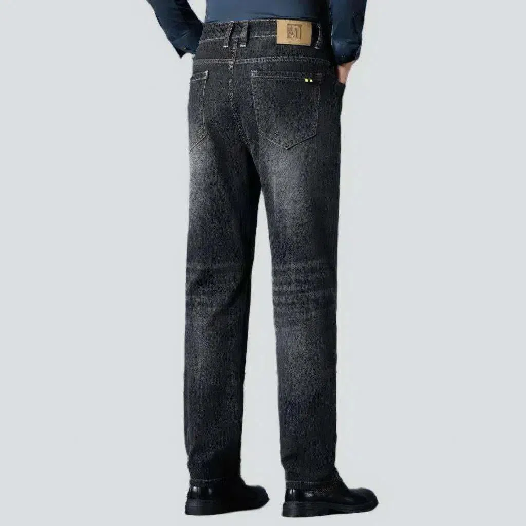 Tapered men's whiskered jeans